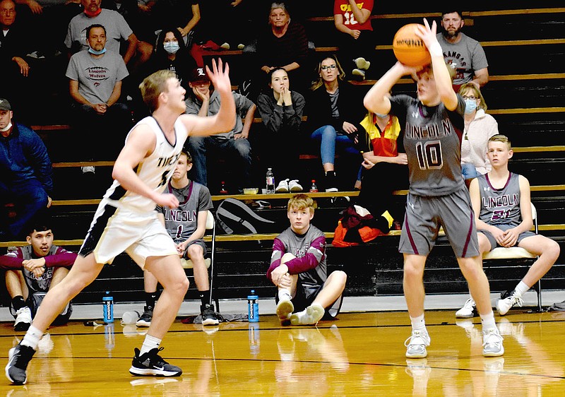 MARK HUMPHREY  ENTERPRISE-LEADER/Lincoln senior Weston Massey launches a 3-pointer against West Fork on Friday, Feb. 5. The Wolves dropped the 3A-1 boys basketball game, 80-65.