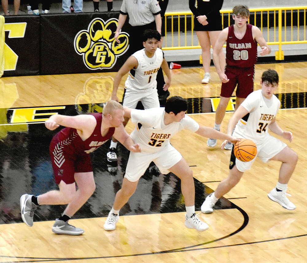 MARK HUMPHREY ENTERPRISE-LEADER/Prairie Grove's Ethan Gross steals the ball while defending the high post.