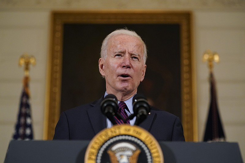 President Joe Biden speaks about the economy in the State Dinning Room of the White House, Friday, Feb. 5, 2021, in Washington. (AP Photo/Alex Brandon)