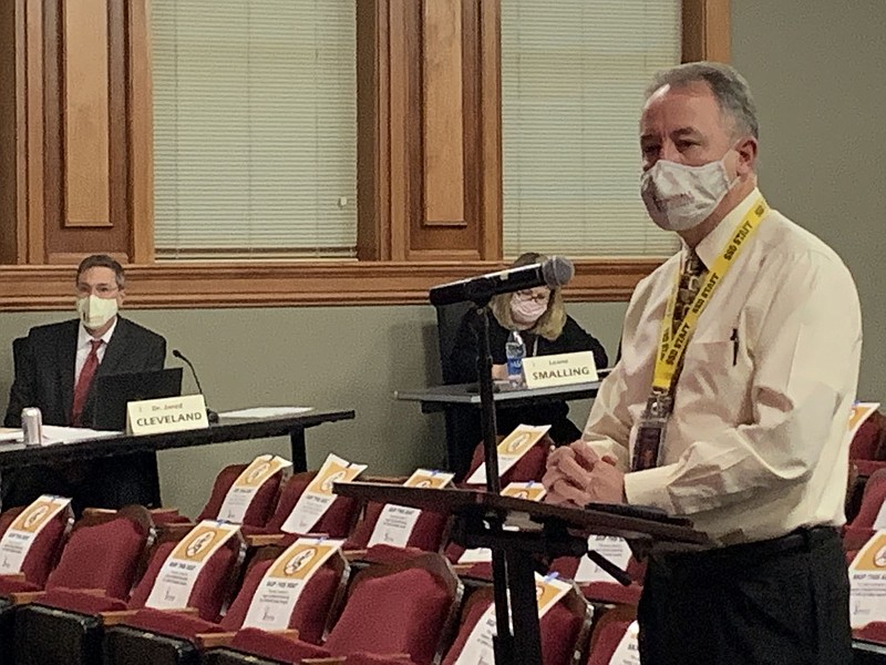 Kelly Hayes, assistant superintendent, discusses property sales Tuesday at a Springdale Public Schools board meeting. (NWA Democrat-Gazette/Mary Jordan)