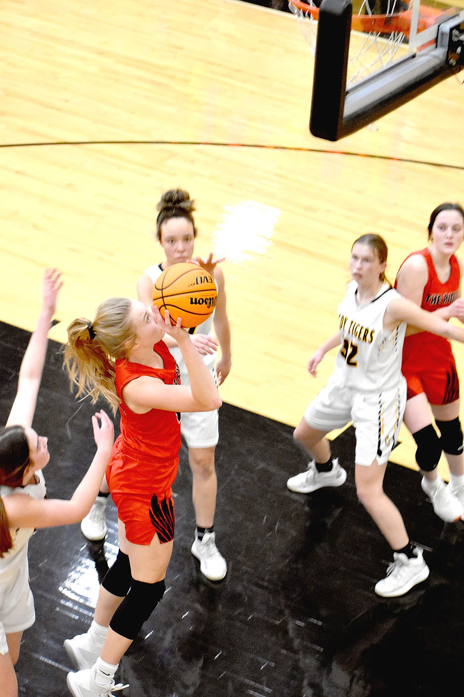 MARK HUMPHREY ENTERPRISE-LEADER/Pea Ridge junior Lauren Wright finishes a drive by scoring in the lane against Prairie Grove. Wright scored 5 points in the Lady Blackhawks' 65-38 win in 4A-1 Conference girls basketball action at Tiger Arena on Tuesday, Feb. 9.