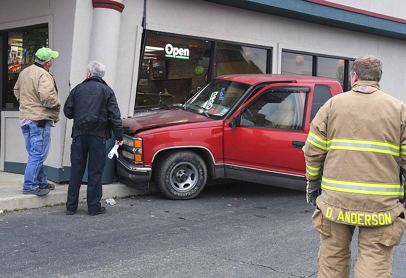 A pickup truck collided with the west corner of the Subway restaurant at 1018 Airport Road on Thursday. - Photo by Grace Brown of The Sentinel-Record
