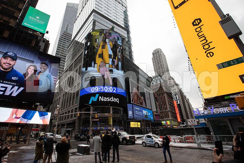 A monitor displays Whitney Wolfe Herd, chief executive officer of Bumble Inc., ringing the opening bell during Bumble Inc.'s initial public offering in front of the Nasdaq MarketSite in New York on Feb. 11, 2021. (Bloomberg /Michael Nagle)