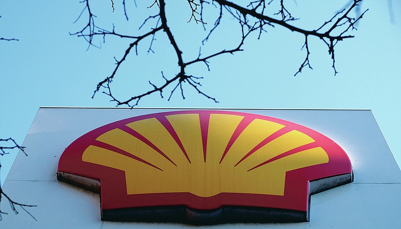 FILE - This Wednesday, Jan. 20, 2016 file photo shows the Shell logo at a petrol station in London. On Friday, Feb. 12, 2021, The Associated Press reported on stories circulating online incorrectly asserting that the oil company Shell is eliminating 9,000 jobs because of President Joe Biden. But energy producer Royal Dutch Shell announced in September 2020 before Biden was elected, that the company would cut up to 9,000 jobs worldwide. (AP Photo/Kirsty Wigglesworth)
