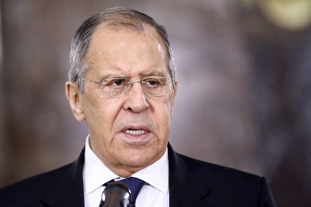 In this photo released by the Russian Foreign Ministry Press Service, Russian Foreign Minister Sergey Lavrov speaks during a meeting in Moscow, Russia, Wednesday, Feb. 10, 2021. Russia is prepared to cut ties with the European Union if the EU imposes new sanctions amid a dispute over the treatment of opposition leader Alexei Navalny, the nation's top diplomat warned Friday. In response to a question on Moscow's willingness to rupture formal relations with the EU, Foreign Minister Sergey Lavrov said in televised remarks that Russia doesn't want to be isolated but is ready to retaliate if the EU action hurts its economy. (Russian Foreign Ministry Press Service via AP)