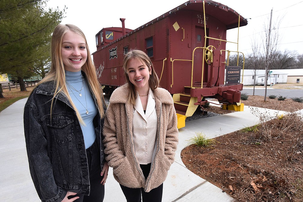 Grace Henly (left), 18, and Betty Gower, 17, hope to have an LGBTQ Pride layout included in the Rogers High School yearbook.
(NWA Democrat-Gazette/Flip Putthoff)