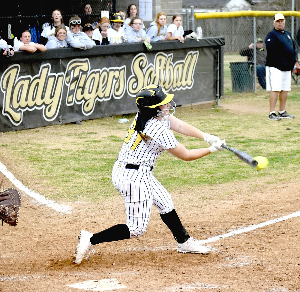 MARK HUMPHREY ENTERPRISE-LEADER/Prairie Grove senior Makinsey Parnell drove a single into the outfield, which she turned into a double on a throw home that gunned down classmate Sydney Stearman at the plate for the second out with the game tied 5-5. Parnell scored the winning run coming from second with Kelsey Pickett smacking a double to drive her in.