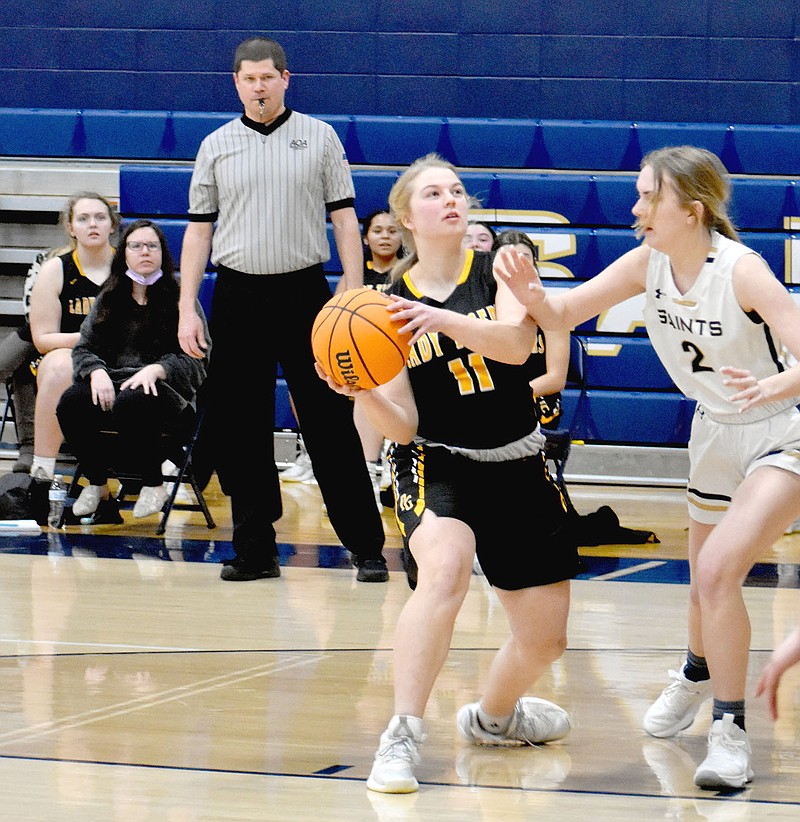 MARK HUMPHREY  ENTERPRISE-LEADER/Prairie Grove senior Gracie Foster scores late in the fourth quarter against Shiloh Christian. Foster scored 5 points during the Lady Tigers' 51-41 District 4A-1 girls basketball tournament loss on Saturday, Feb. 13.