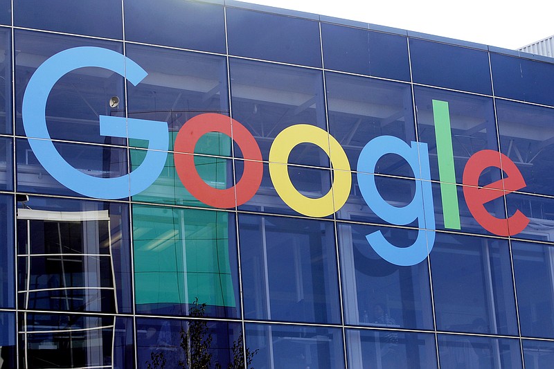 FILE - In this Sept. 24, 2019, file photo a sign is shown on a Google building at their campus in Mountain View, Calif. Australia’s Parliament will debate making Google and Facebook pay for news after a Senate committee on Friday, Feb. 12, 2021 recommended no changes to the world-first draft laws. (AP Photo/Jeff Chiu, File)