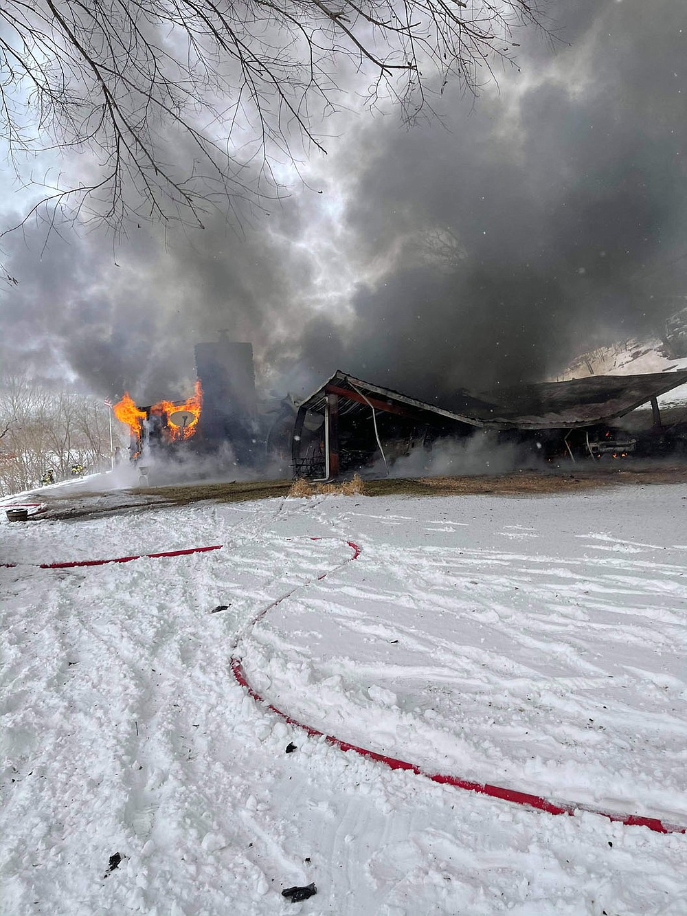Courtesy photo/Special to the McDonald County Press A house that caught fire on Little Missouri Hollow on Monday afternoon has been deemed a total loss, said White Rock Fire Department Chief Jason Bowman. Cause of fire could not be determined because the structure was too destroyed, he said.