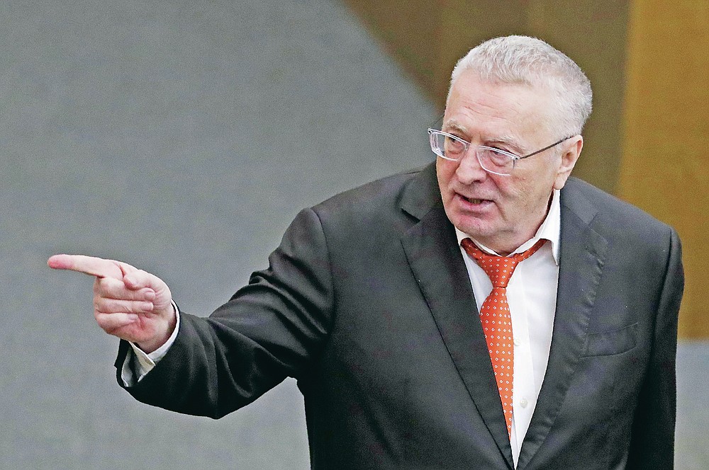 FILE - In this March 11, 2020 file photo, Russian Liberal Democratic Party leader Vladimir Zhirinovsky speaks during a session at the State Duma, the Lower House of the Russian Parliament in Moscow, Russia. Zhirinovsky, the nationalistic leader of the Liberal Democratic Party of Russia, suggested that the U.S. and its greedy pharmaceutical companies were to blame for the coronavirus. (AP Photo/Pavel Golovkin)