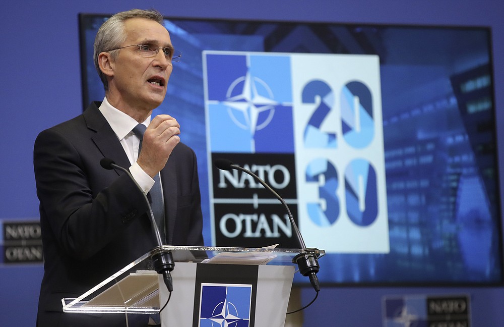NATO Secretary General Jens Stoltenberg speaks during a media conference ahead of a NATO defense minister's meeting at NATO headquarters in Brussels, Monday, Feb. 15, 2021. (Olivier Hoslet, Pool via AP)