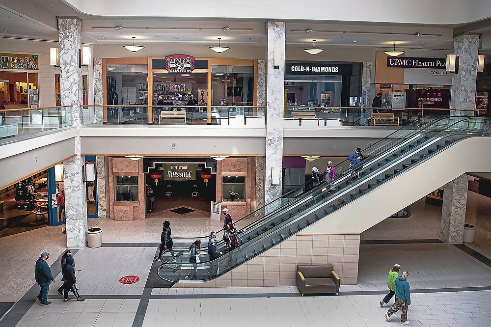 The Living Dead Museum in the Monroeville Mall is seen among other stores, Saturday, Feb. 6, 2021, in Monroeville, Pa. The Living Dead Museum, an institution dedicated to honoring the seminal 1968 zombie film “Night of the Living Dead” and its auteur, George Romero, had been a fixture in downtown Evans City since 2013. (Alexandra Wimley /Pittsburgh Post-Gazette via AP)