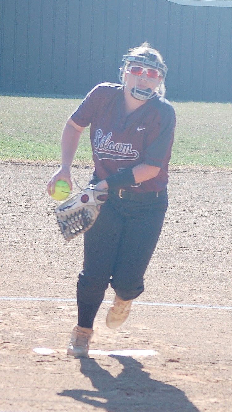 Graham Thomas/Herald-Leader file photo
Siloam Springs pitcher Kennedy Wilkie prepares to throw a pitch during a game against Huntsville last season. Wilkie is expected to be the SSHS softball team's primary pitcher for the 2021 season.