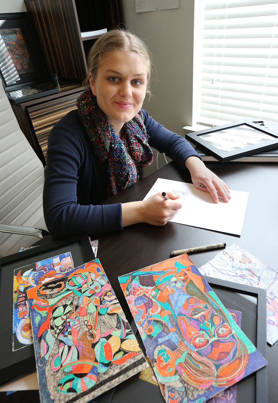 Visual artist Hannah Jeremiah continues to draw Wednesday, February 17, 2021, in her apartment in Fayetteville. Jeremiah is attending the first Artist INC Express workshop held in Arkansas. Artist INC has to date only been offered in NWA for Arkansas through the M-AAA. The program helps participants develop business skills as working artists. Check out nwaonline.com/210218Daily/ and nwadg.com/photos for a photo gallery.
(NWA Democrat-Gazette/David Gottschalk)