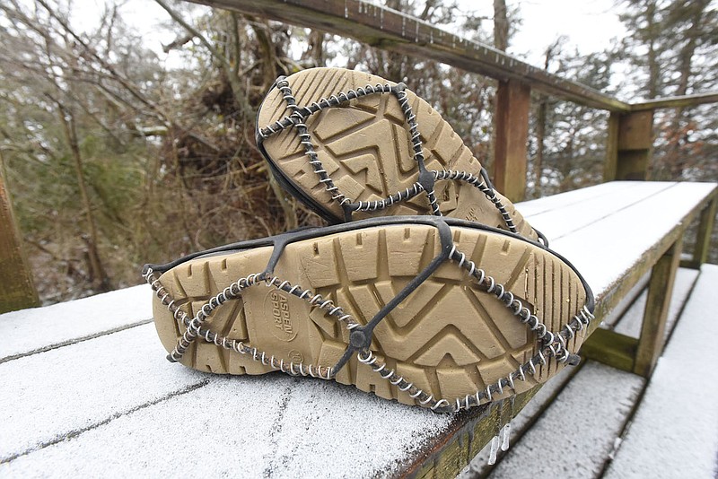 Ice and snow grippers for shoes and boots, such as these Yaktrax, make it easier to navigate in slick conditions. They're like tire chains for the feet. A basic set of sells for around $20.
(NWA Democrat-Gazette/Flip Putthoff)