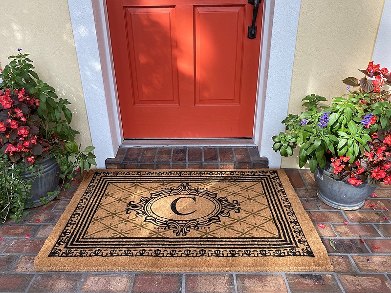 Show you care ― Your front door is your handshake to the world. The ideal doormat is a little wider than your threshold, as pictured. (Courtesy of Marni Jameson)