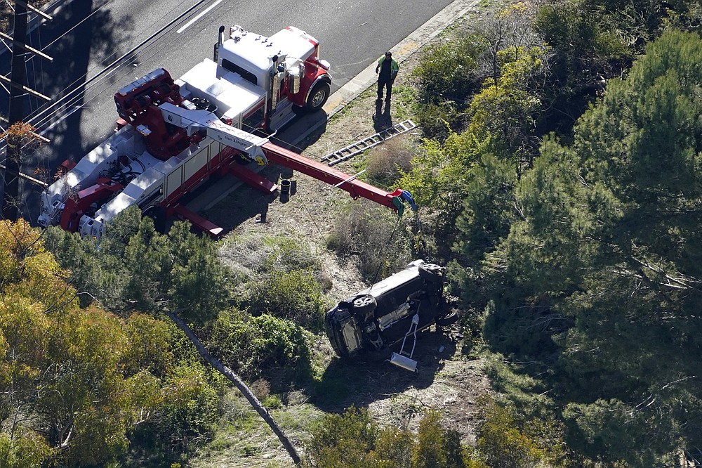 Woods in serious car accident