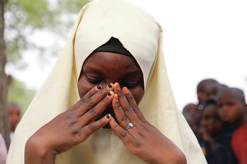 A student who survived the attack in which her schoolmates were taken is seen at the Government Girls Junior Secondary School in Jangebe.
(AP/ Ibrahim Mansur)