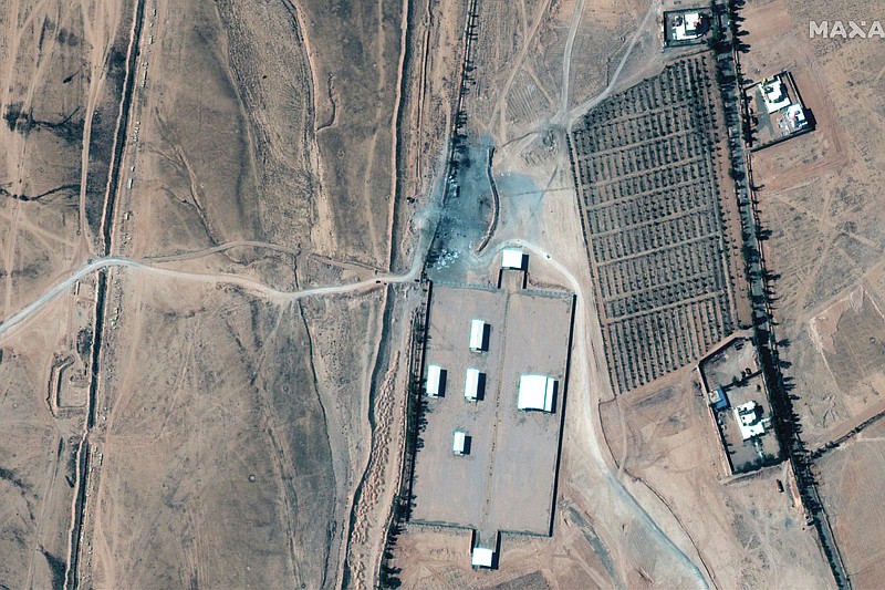 This satellite image provided Maxar Technologies shows buildings that were destroyed by a U.S. air strike in Syria. The United States launched airstrikes in Syria on Thursday, Feb. 25, 2021 targeting facilities near the Iraqi border used by Iranian-backed militia groups. The Pentagon said the strikes were retaliation for a rocket attack in Iraq earlier this month that killed one civilian contractor and wounded a U.S. service member and other coalition troops. (Satellite image ©2021 Maxar Technologies via AP)