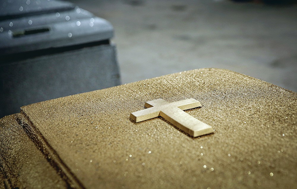 Burial vault company workers say they try to do their best