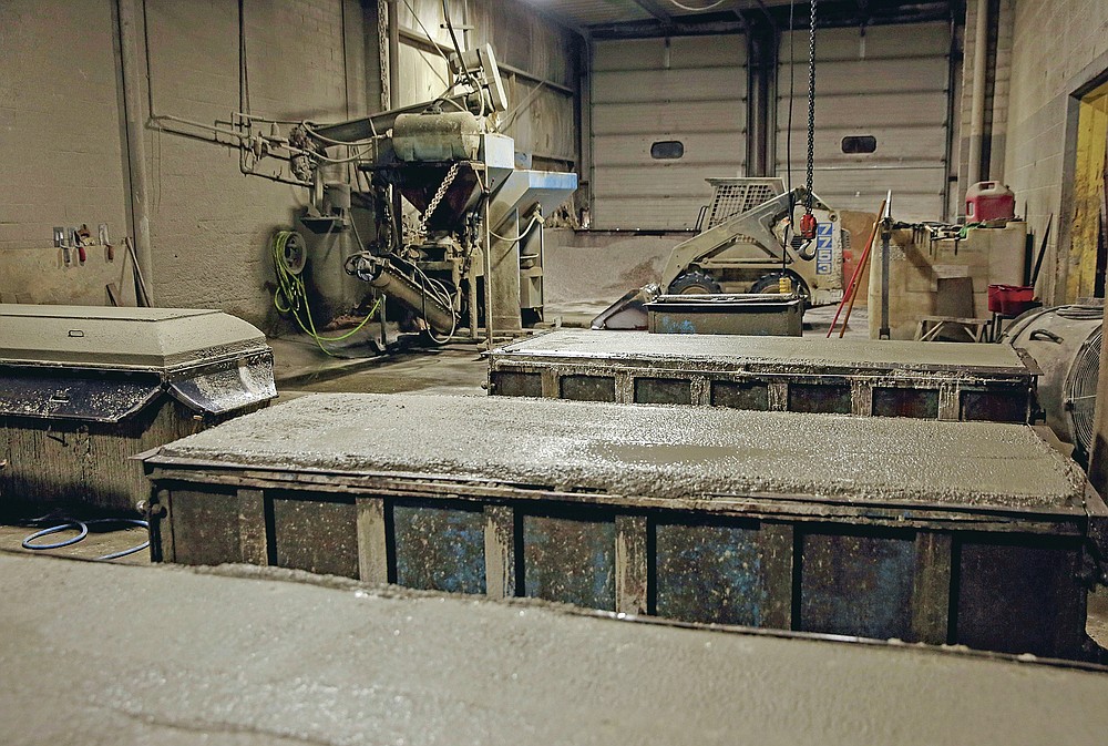 Burial vault company workers say they try to do their best