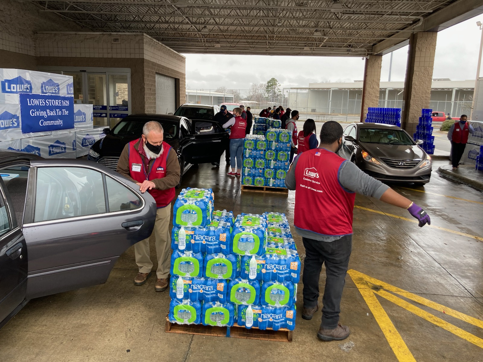 Bottled water runs out fast at giveaway events