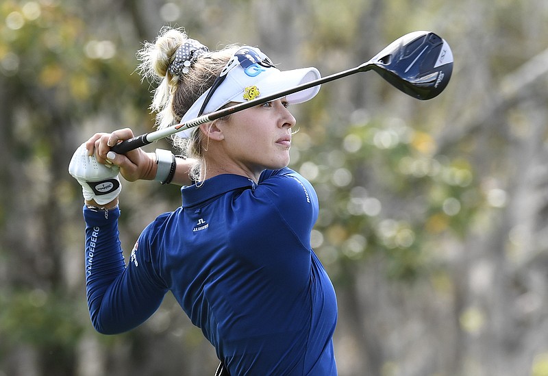 Nelly Korda plays a tee shot on the fifth hole during the third round of the Gainbridge LPGA golf tournament Thursday, Sept. 27, 2021, in Orlando, Fla. (AP Photo/Stan Badz)