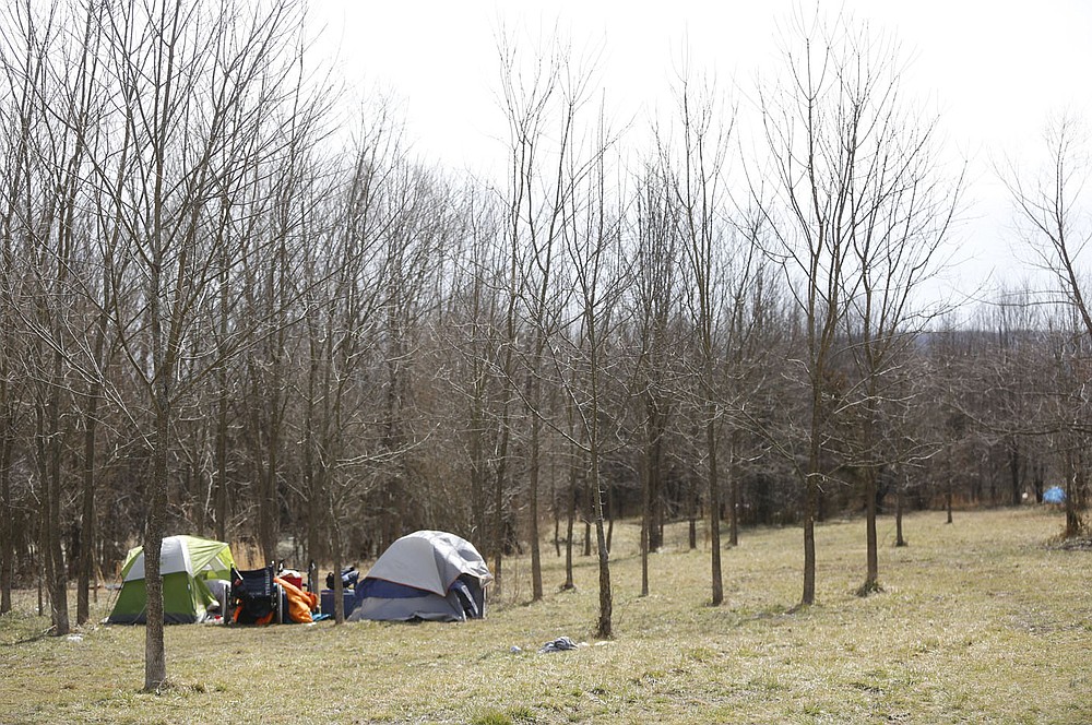 A campsite is visible Thursday, February 25, 2021, at Safe Camp, the city-sanctioned encampment for people experiencing homelessness, in Fayetteville. Several area agencies worked to get unsheltered people out of record cold and heavy snowfall earlier this month and into hotels and shelters with food and transportation provided. Check out nwaonline.com/210228Daily/ and nwadg.com/photos for a photo gallery.
(NWA Democrat-Gazette/David Gottschalk)