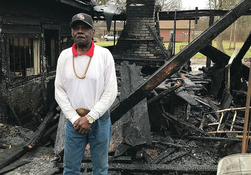 James Harold Jones, the owner of Jones Bar-B-Cue Diner in Marianna, stands by the restaurant’s pit area, which was destroyed by fire Sunday morning. The restaurant building itself was partially damaged, he said.
Photo by Steve Higginbothom