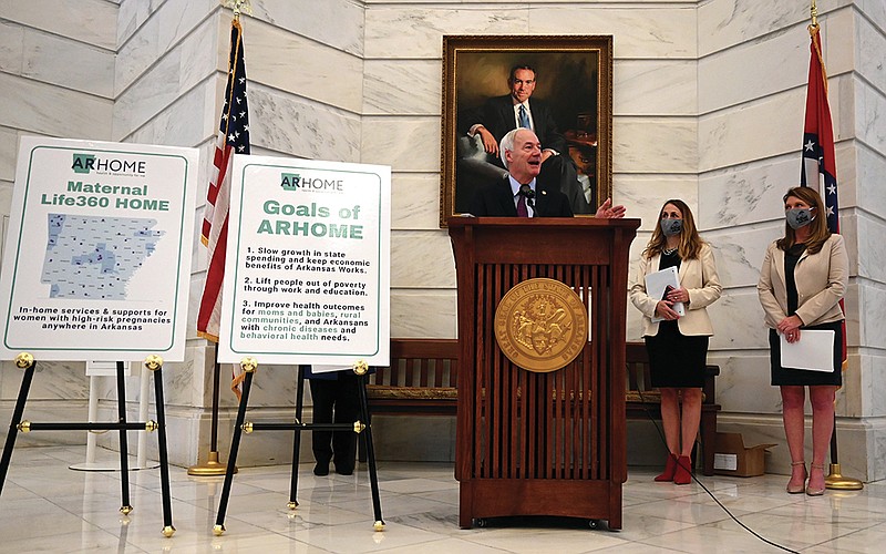 Governor Asa Hutchinson addresses the media during press conference as he, State Legislators Sen. Missy Irvin, Rep. Michelle Gray and Arkansas Department of Human Services (DHS) Secretary Cindy Gillespie discuss proposed legislation to replace the Arkansas Works program in the rotunda of the Arkansas State Capitol on Monday, March 1, 2021. See more photos at arkansasonline.com/32home/

(Arkansas Democrat-Gazette/Stephen Swofford)