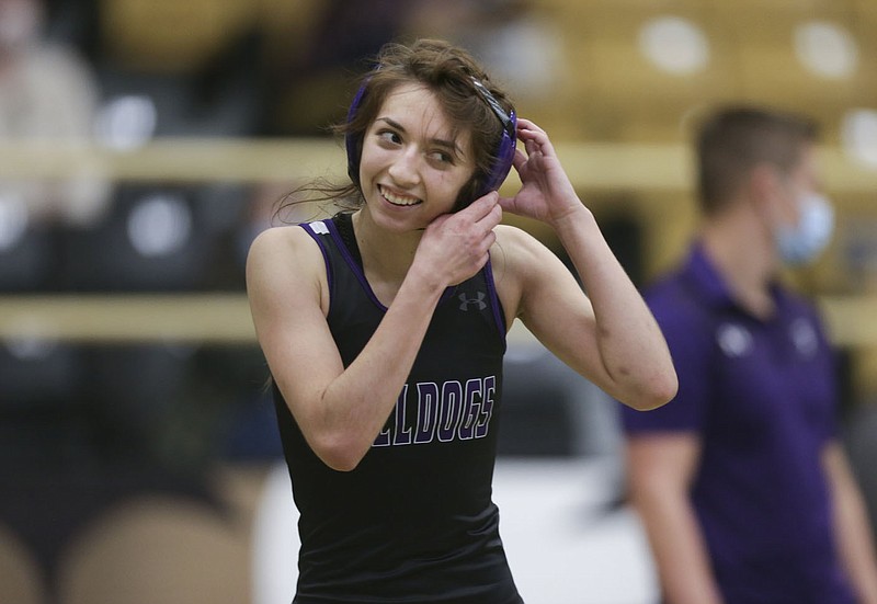 Fayetteville High School wrestler Abigail Fimbres reacts, Friday, January 23, 2022 during a wrestling match at Bentonville High School in Bentonville. Fimbres will compete in the Class 6A state wrestling meet today at the University of Arkansas-Little Rock.
(NWA Democrat-Gazette/Charlie Kaijo)