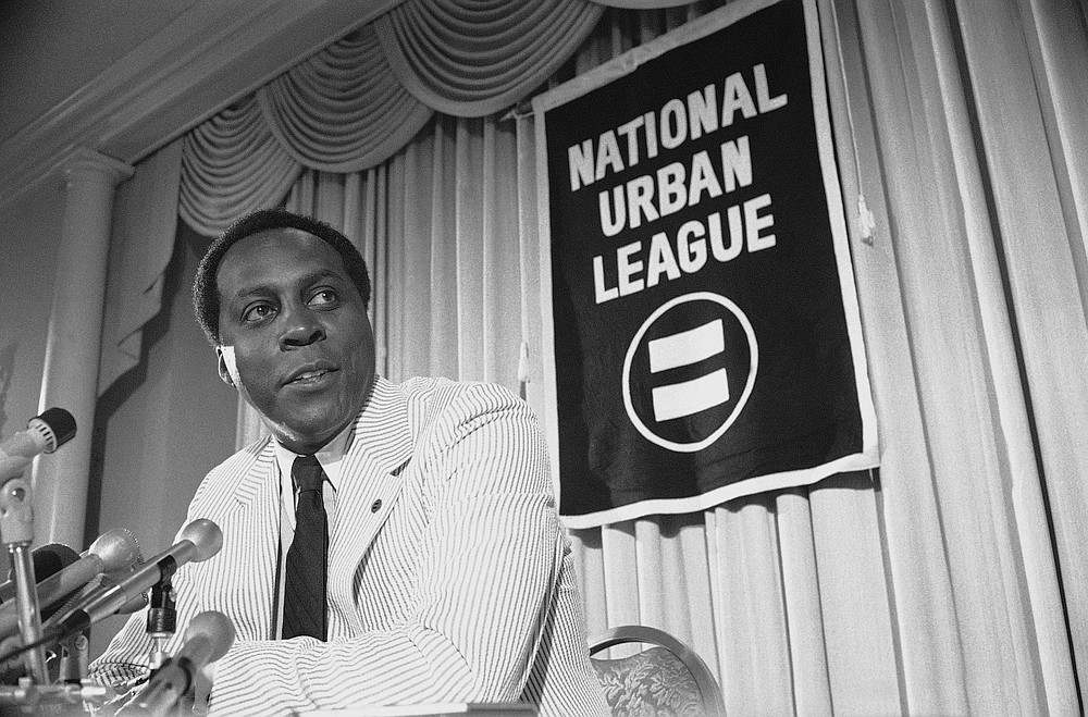 FILE - In this July 27, 1977 file photo, Vernon Jordan, President of the National Urban League, talks to reporters during a press conference in Washington. Jordan, who rose from humble beginnings in the segregated South to become a champion of civil rights before reinventing himself as a Washington insider and corporate influencer, died Tuesday, March 2, 2021, according to a statement from his daughter. He was 85. (AP Photo/File)