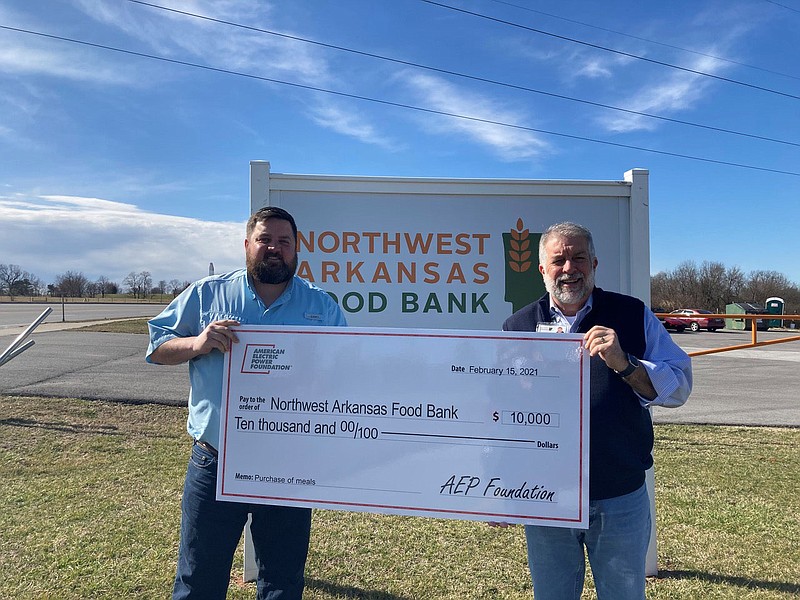 The Northwest Arkansas Food Bank received a donation of $10,000 from SWEPCO. Pictured are Mike Williams and Kent Eikenberry with the NWA Food Bank. This donation will provide up to 80,000 meals for the food insecure in the four counties we serve in the NWA region.

(Photo submitted)