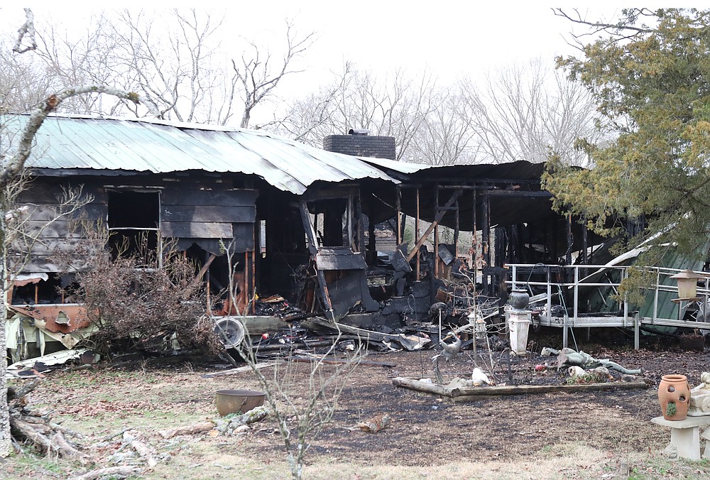 Second structure fire with propane explosions battled by firefighters