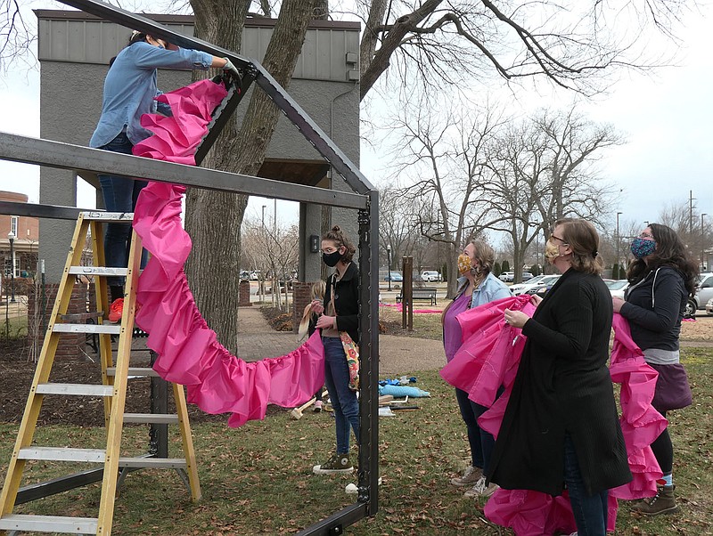 Photo submitted
A team of volunteers installed the sculpture "Guide These, My Hands," on Feb. 27 in Bentonville's Train Station Park.