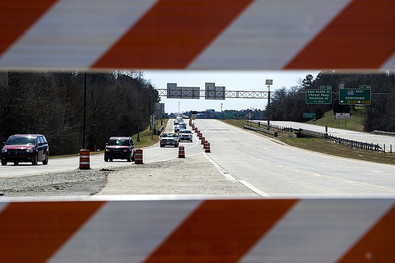 Cars are diverted off of I-40 North as the highway is shut down for construction on Saturday, March 6, 2021. Most traffic was diverted through a neighborhood in Pleasant Valley, while large trucks were instructed to turn around and head back south to avoid complications with the neighborhood traffic.

(Arkansas Democrat-Gazette/Stephen Swofford)