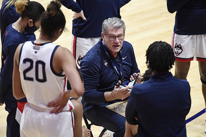 Connecticut head coach Geno Auriemma talks to his team during the second half of Saturday's game against St. John's in the quarterfinals of the Big East Conference tournament at Mohegan Sun Arena in Uncasville, Conn. - Photo by Jessica Hill of The Associated Press
