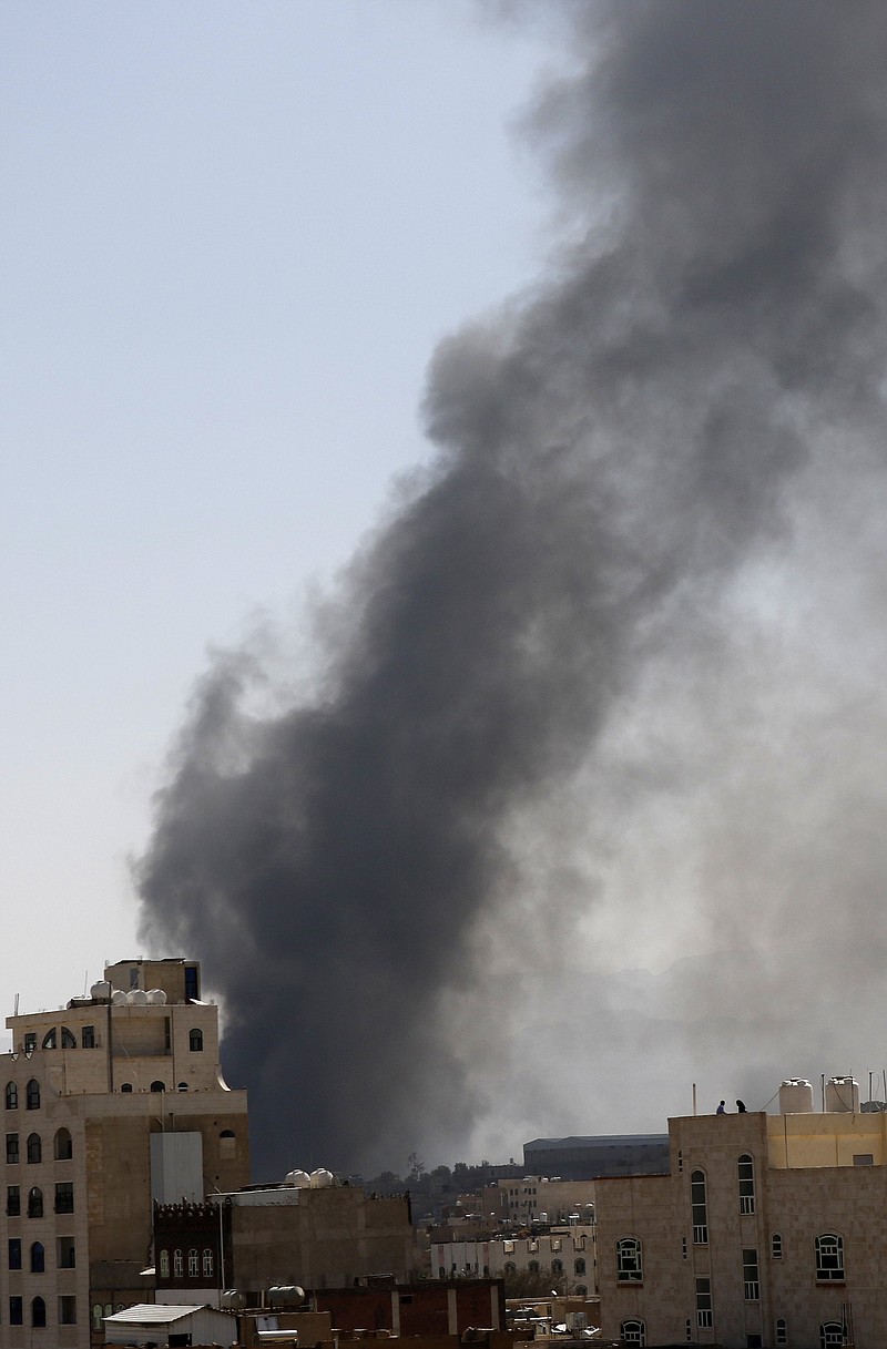 Smoke rises after Saudi-led airstrikes on an army base in Sanaa, Yemen, Sunday, Mar. 7, 2021. The Saudi-led coalition fighting Iran-backed rebels in Yemen said Sunday it launched a new air campaign on the war-torn country’s capital and on other provinces. The airstrikes come as retaliation for recent missile and drone attacks on Saudi Arabia that were claimed by the Iranian-backed rebels. (AP Photo/Hani Mohammed)