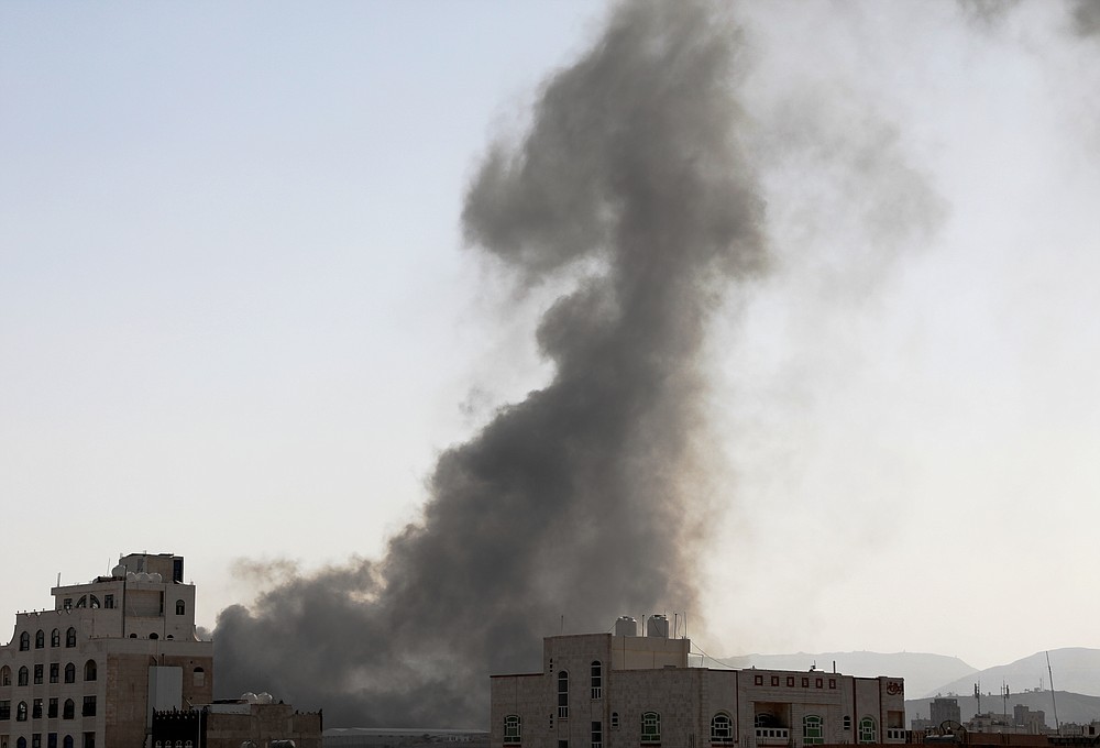 Smoke rises after Saudi-led airstrikes on an army base in Sanaa, Yemen, Sunday, Mar. 7, 2021. The Saudi-led coalition fighting Iran-backed rebels in Yemen said Sunday it launched a new air campaign on the war-torn country’s capital and on other provinces. The airstrikes come as retaliation for recent missile and drone attacks on Saudi Arabia that were claimed by the Iranian-backed rebels. (AP Photo/Hani Mohammed)