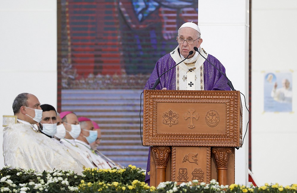 Pope Francis delivers his homily during a mass at the Franso Hariri Stadium in Irbil, Kurdistan Region of Iraq, Sunday, March 7, 2021. The Vatican and the pope have frequently insisted on the need to preserve Iraq's ancient Christian communities and create the security, economic and social conditions for those who have left to return.(AP Photo/Andrew Medichini)