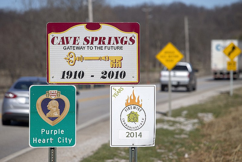 NWA Democrat-Gazette/File Photo Traffic travels north along Main Street on Jan. 28 into Cave Springs.