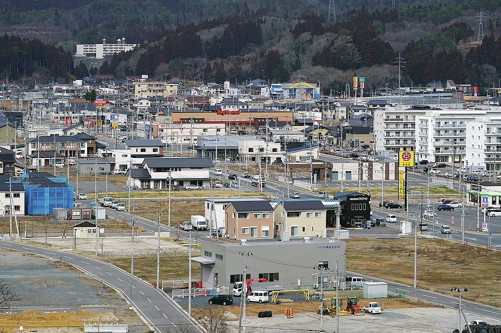 Tsunami-ravaged residential area in Kesennuma, Miyagi Prefecture, northeast Japan, can be seen on Friday, March 5, 2021.  (AP Photo / Eugene Hoshiko)