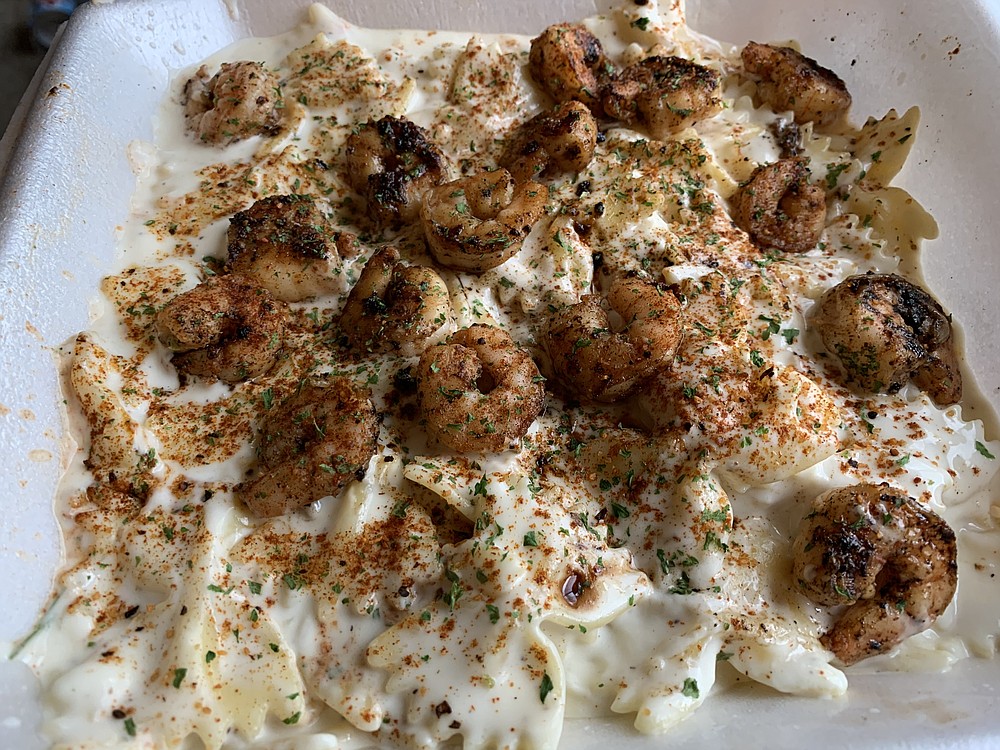 Grilled Cajun Alfredo with shrimp was an enormous amount of food for lunch, and took twice as long to emerge from the food truck as we expected. (Arkansas Democrat-Gazette/Eric E. Harrison)