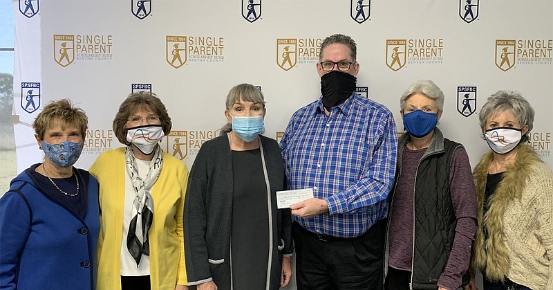 On March 15, members of Altrusa International of Bentonville/Bella Vista presented a check for $500 to the Single Parent Scholarship Fund of Benton County's director, Jack Eaton. Pictured from left are club members Linda Krysl, Karen Robbins, Vella Lewis, SPFS Director Jack Eaton, club members Tina Brandt and Valerie Katz.

(Courtesy photo)