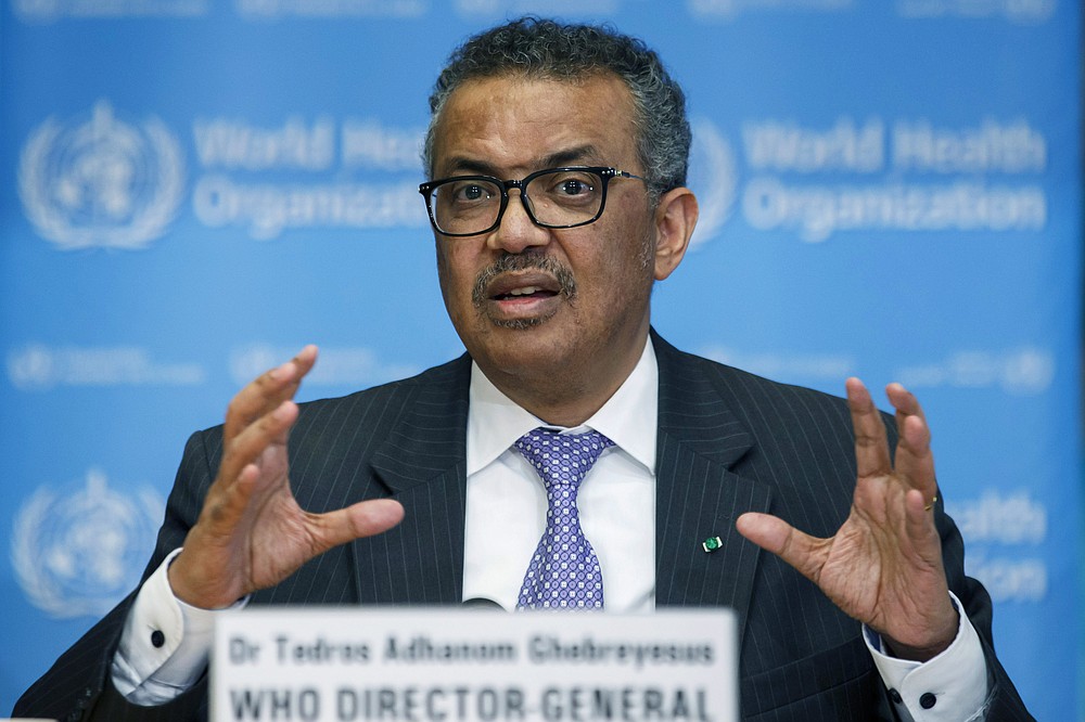 FILE - In this Monday, March 9, 2020 file photo, Tedros Adhanom Ghebreyesus, Director General of the World Health Organization speaks during a news conference, at the WHO headquarters in Geneva, Switzerland. When the World Health Organization declared the coronavirus a pandemic one year ago Thursday, March 11 it did so only after weeks of resisting the term and maintaining the highly infectious virus could still be stopped. A year later, the U.N. agency is still struggling to keep on top of the evolving science of COVID-19, to persuade countries to abandon their nationalistic tendencies and help get vaccines where they’re needed most. (Salvatore Di Nolfi/Keystone via AP, file)