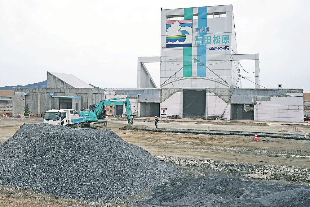 A roadside station destroyed by the 2011 tsunami is seen in Rikuzentakata, Iwate Prefecture, Friday, March 5, 2021. In Rikuzentakata more than 1,700 people died by the March 11, 2011 disaster. (AP Photo/Eugene Hoshiko)