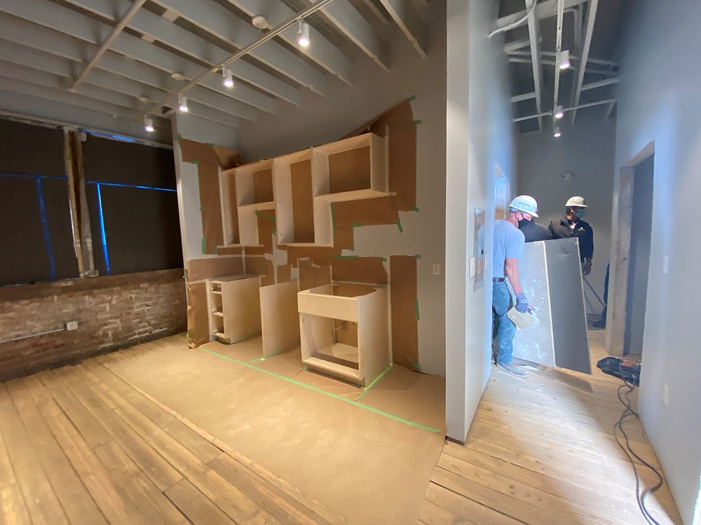 The sheetrock is dry and the East Harding Construction crew is working on the finishing touches of The ARTworks on Main's five apartments and five work studio spaces. (Special to The Commercial/Deborah Horn)