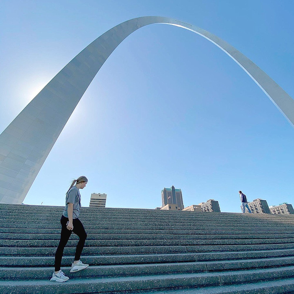 Submitted Photo/Lincoln rising ninth grader Brinkley Moreton stands in front of the Gateway Arch at St. Louis. Brinkley, daughter of Dax and Christina Moreton of Summers, was treated at Barnes Jewish Hospital, of St. Louis, which became the gateway for her miraculous return to competitive softball this summer after experiencing a blood clot in her right arm.