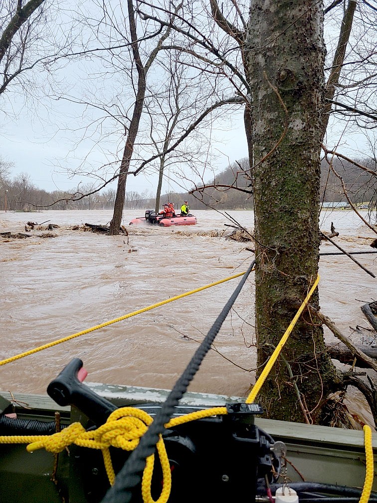 COURTESY PHOTO Emergency personnel performed a water rescue of two individuals early Saturday near Tiff City on Buffalo Creek.